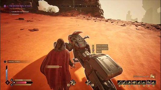 Sandbike maneuvering through rocky desert terrain